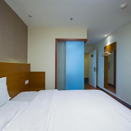 Отель 7Days Premium Guilin Seven Star International Exhibition Center Номер фото